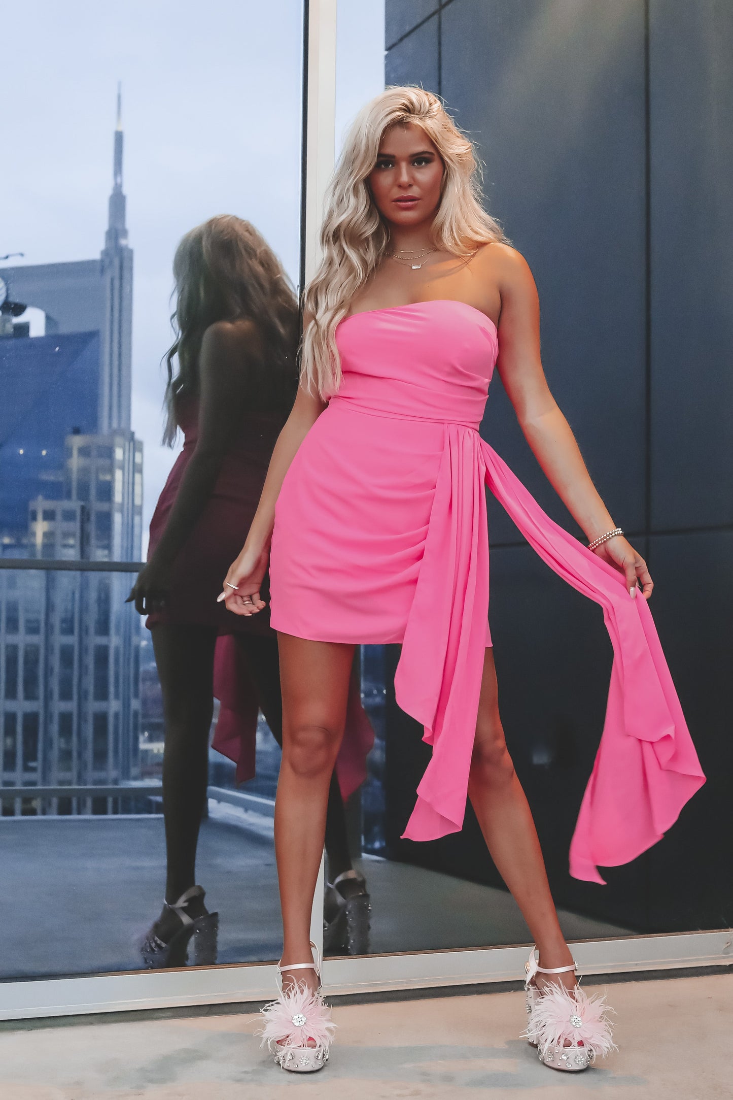 She Is A Standout Neon Strapless Dress