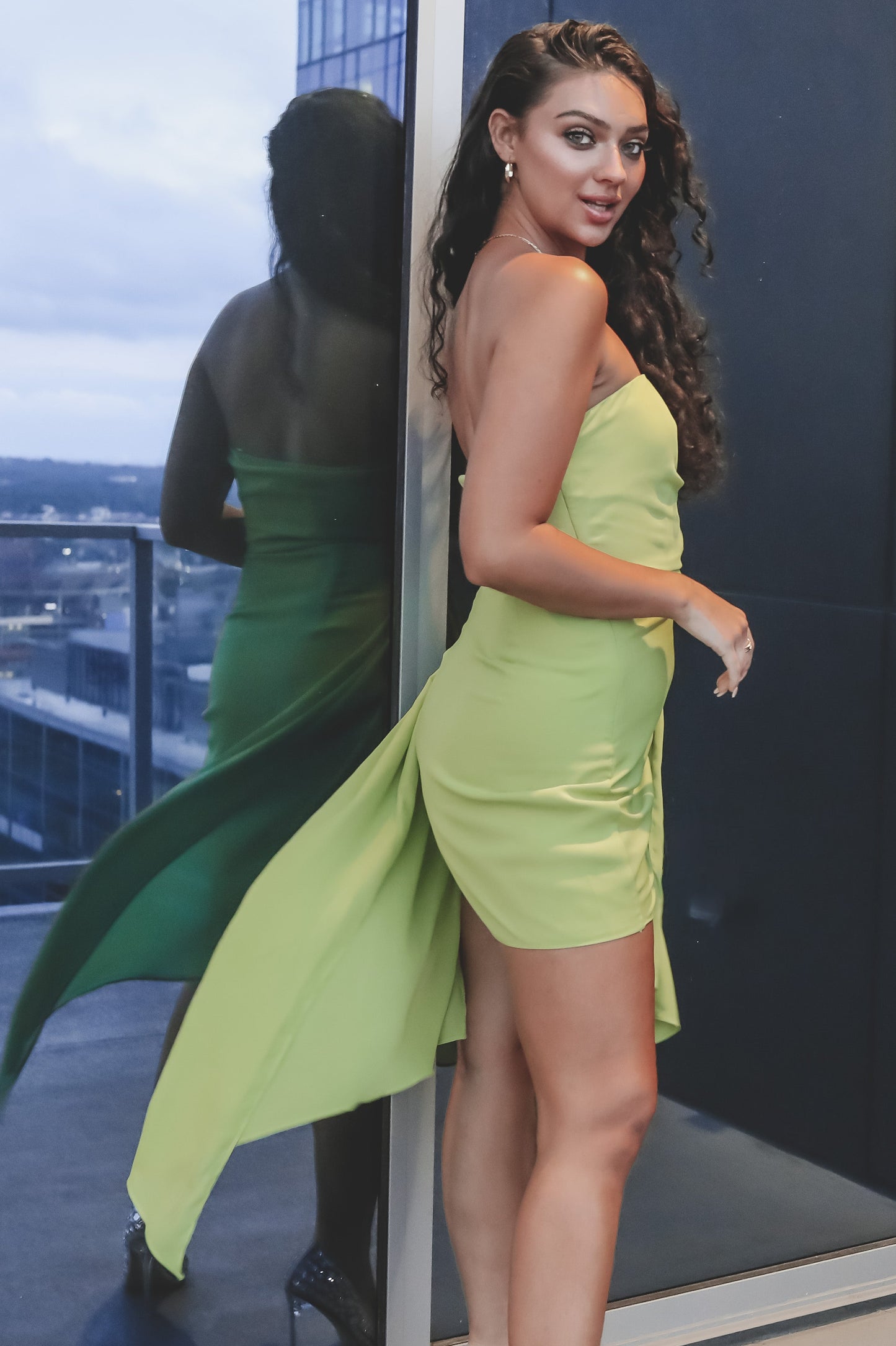 She Is A Standout Neon Strapless Dress